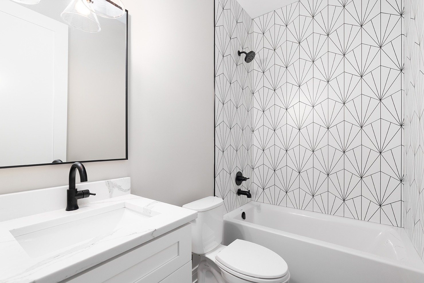 Beautiful Patterned Shower Tiling in Luxury Bathroom Renovation.