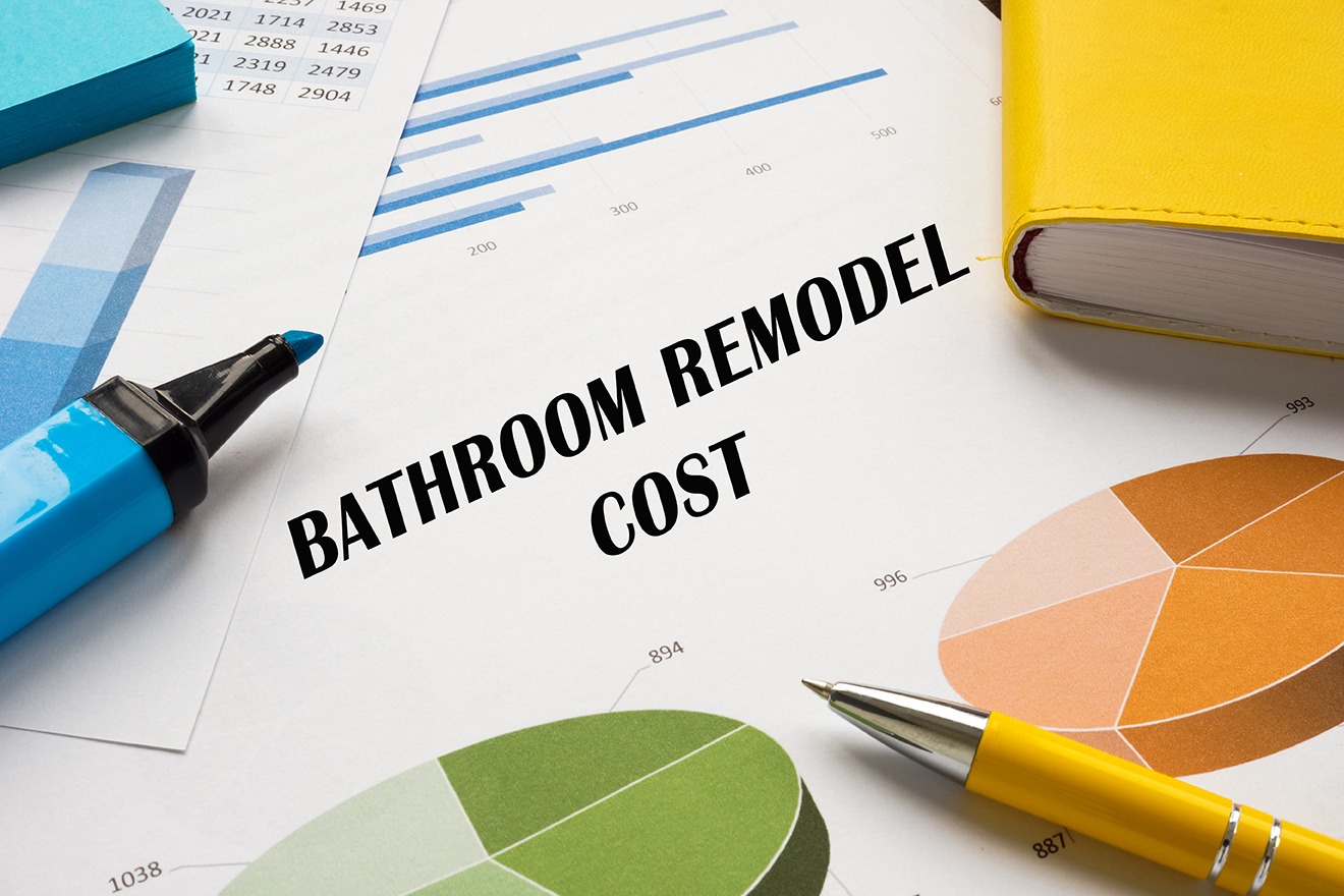 Financial concept about BATHROOM REMODEL COST with phrase on the piece of paper.